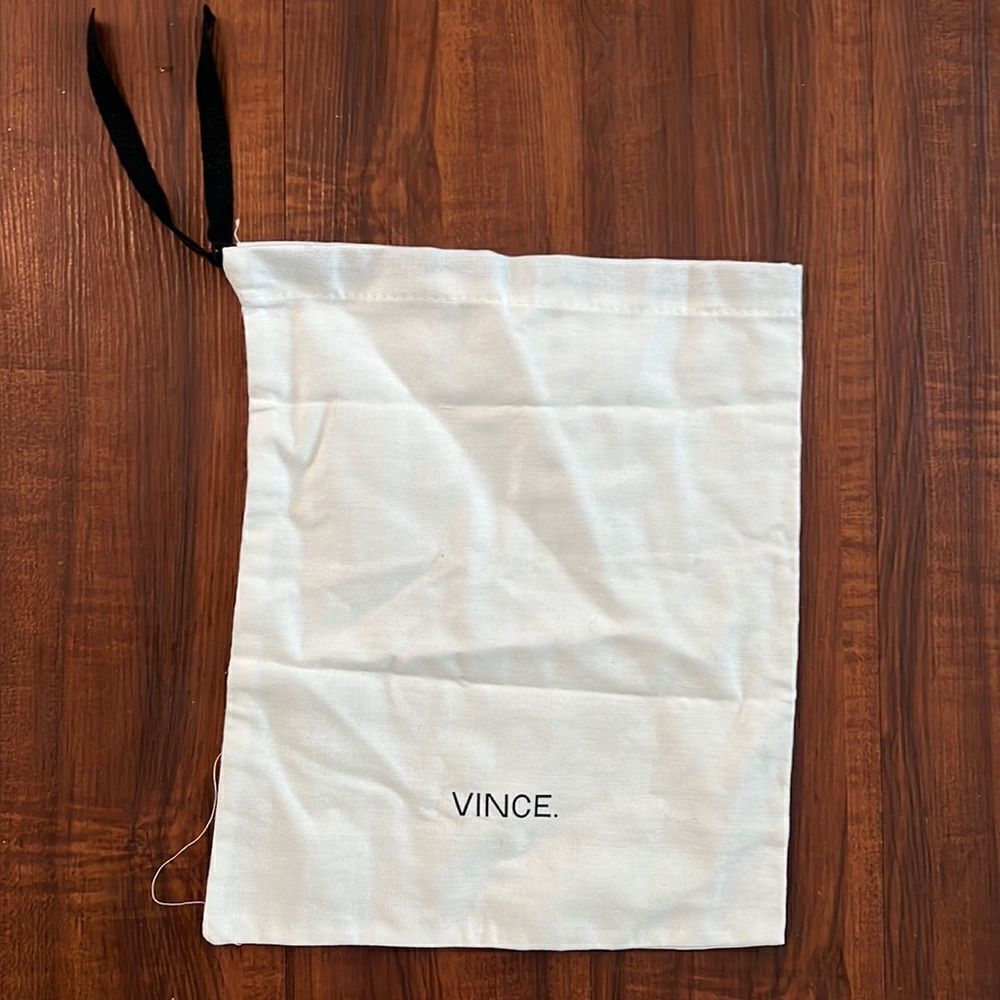 Vince White dust bag